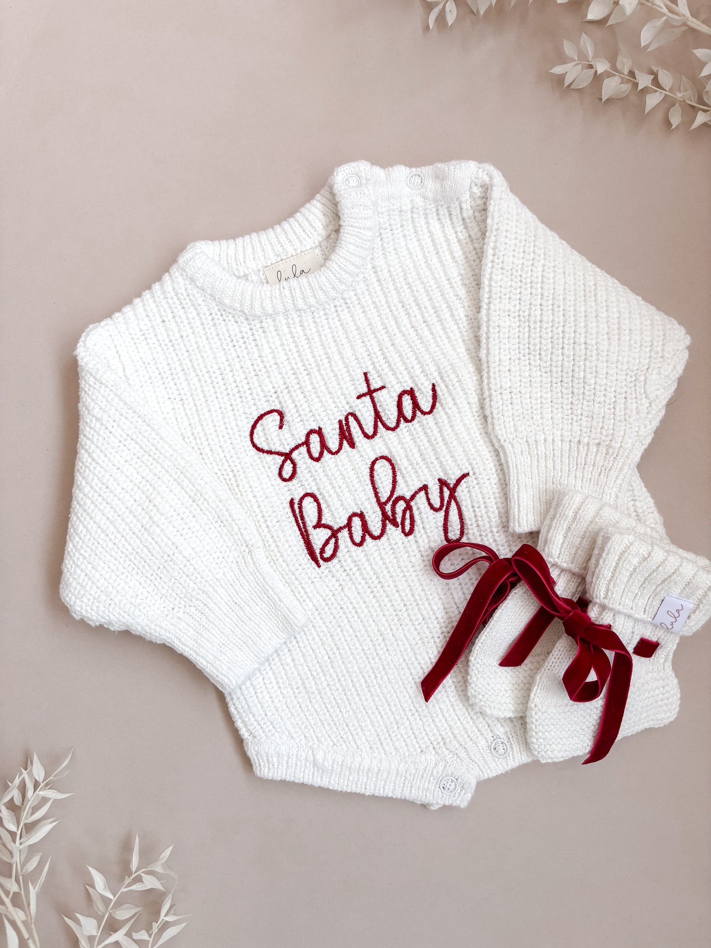 White baby romper with 'Santa Baby' embroidery and Christmas baby booties