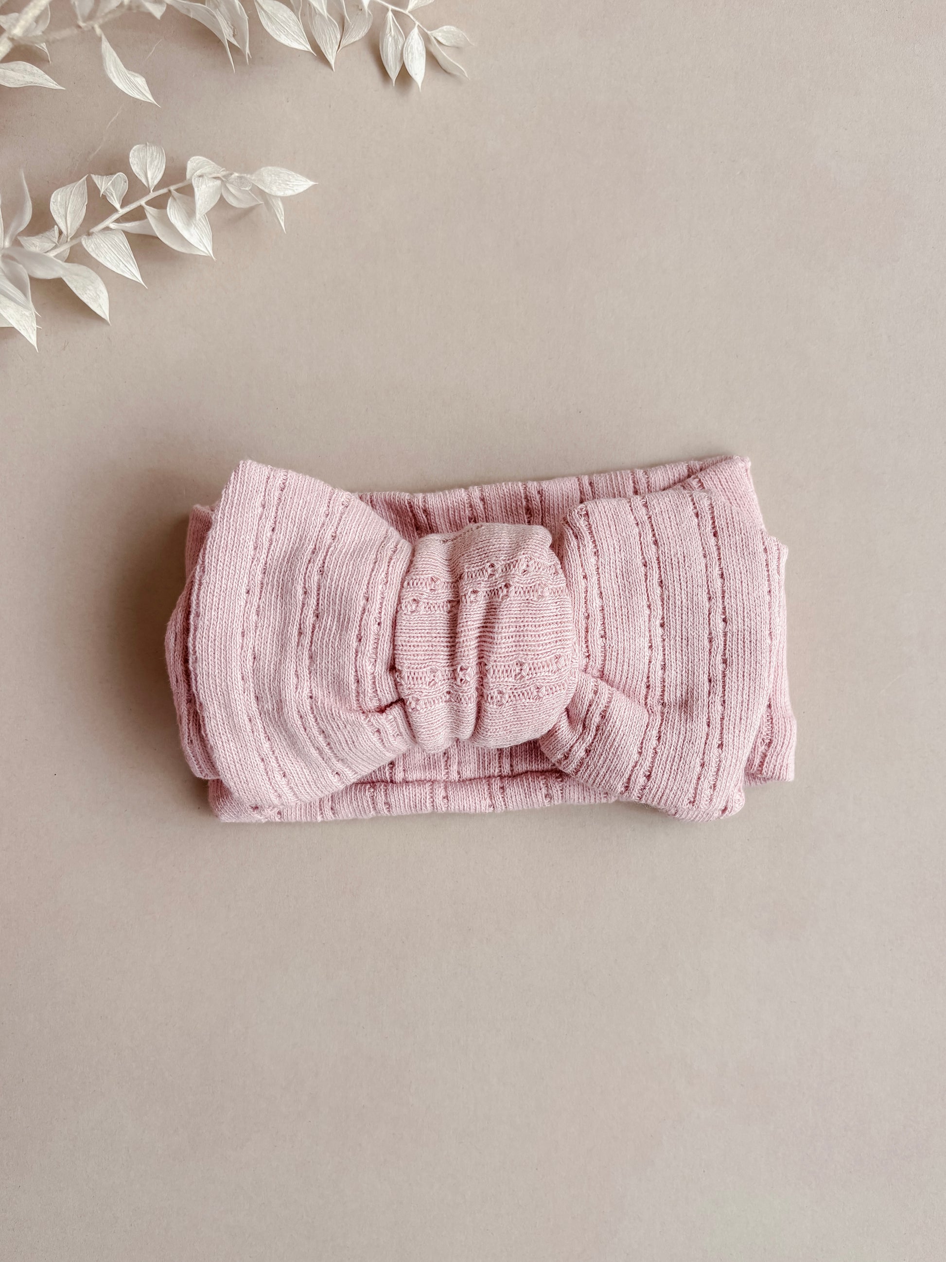 baby bow headband in dusky pink