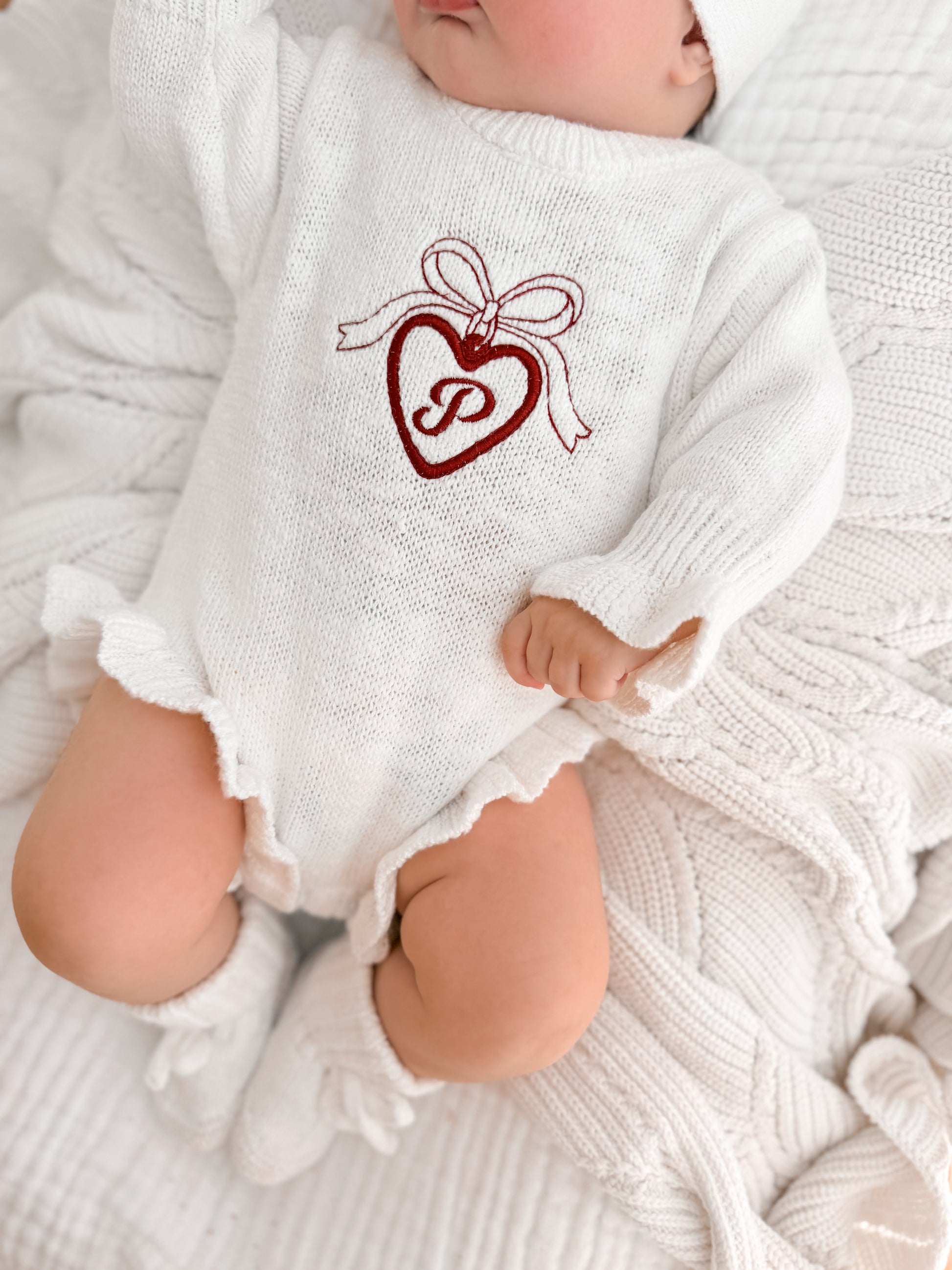 personalised knit baby romper - initial in locket