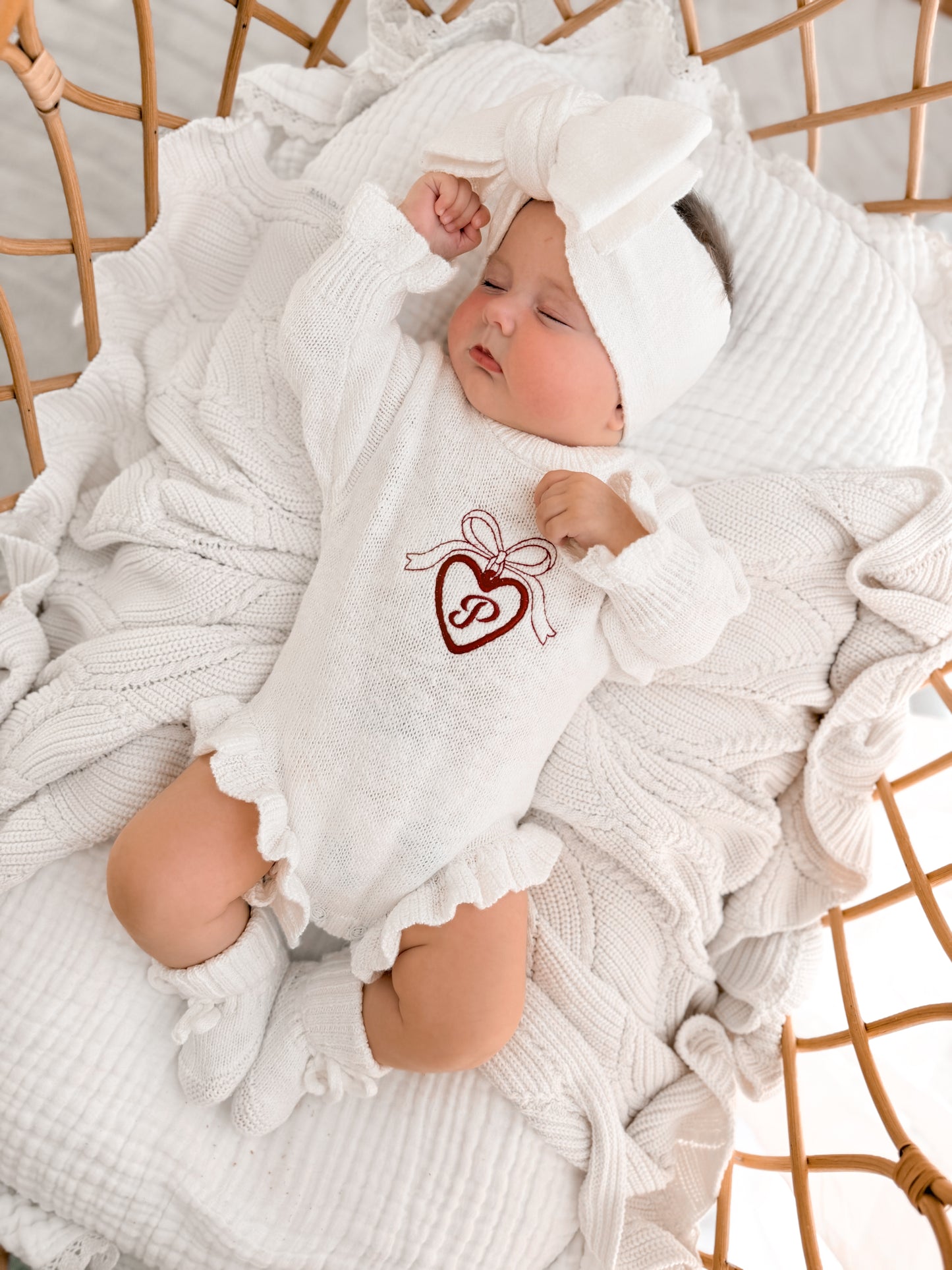 personalised knit baby romper - initial in locket