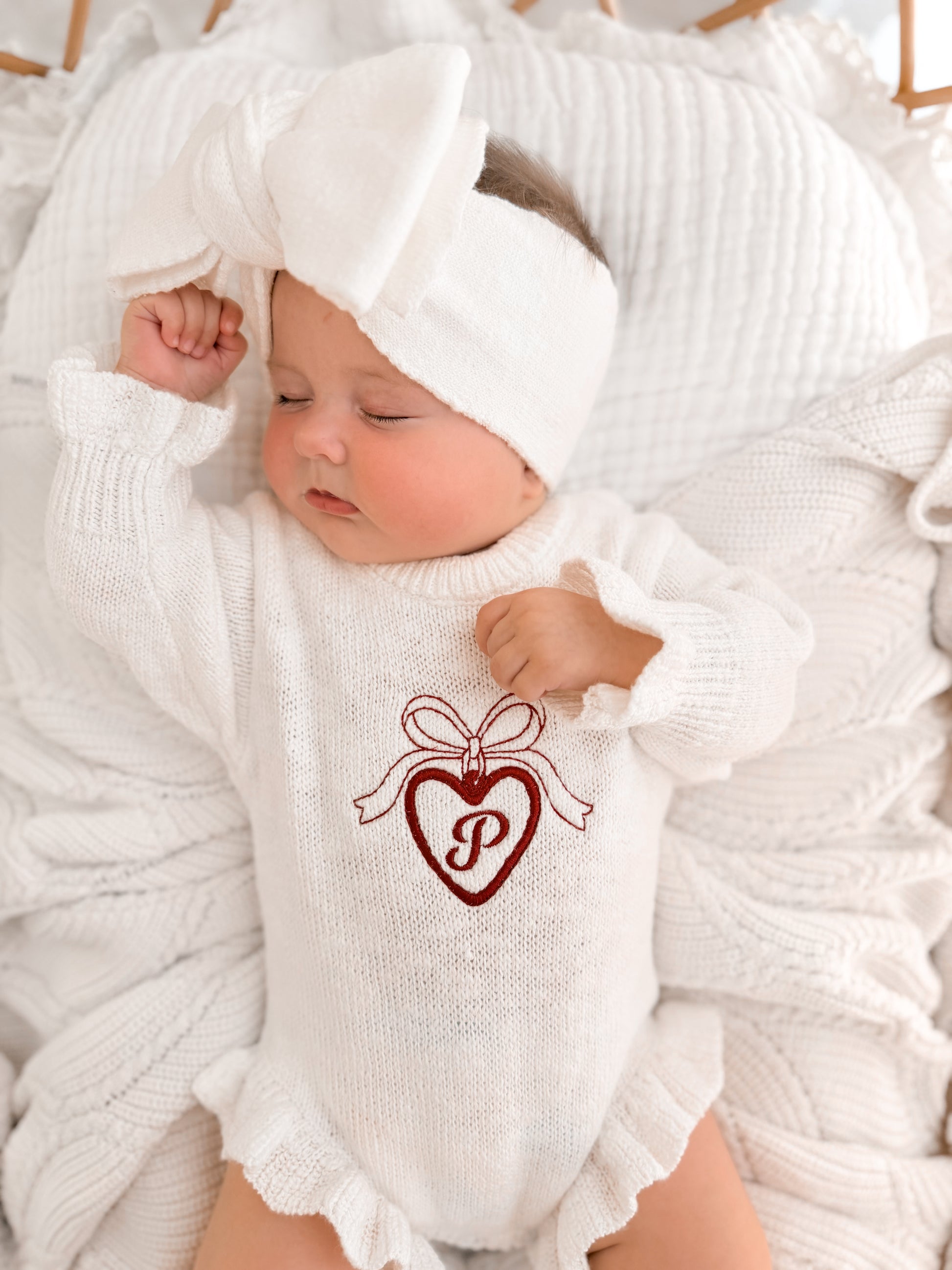 personalised knit baby romper - initial in locket