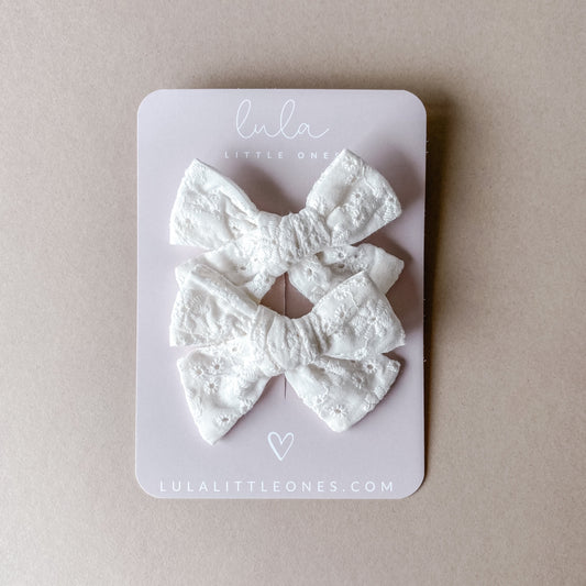 pigtail bows - white