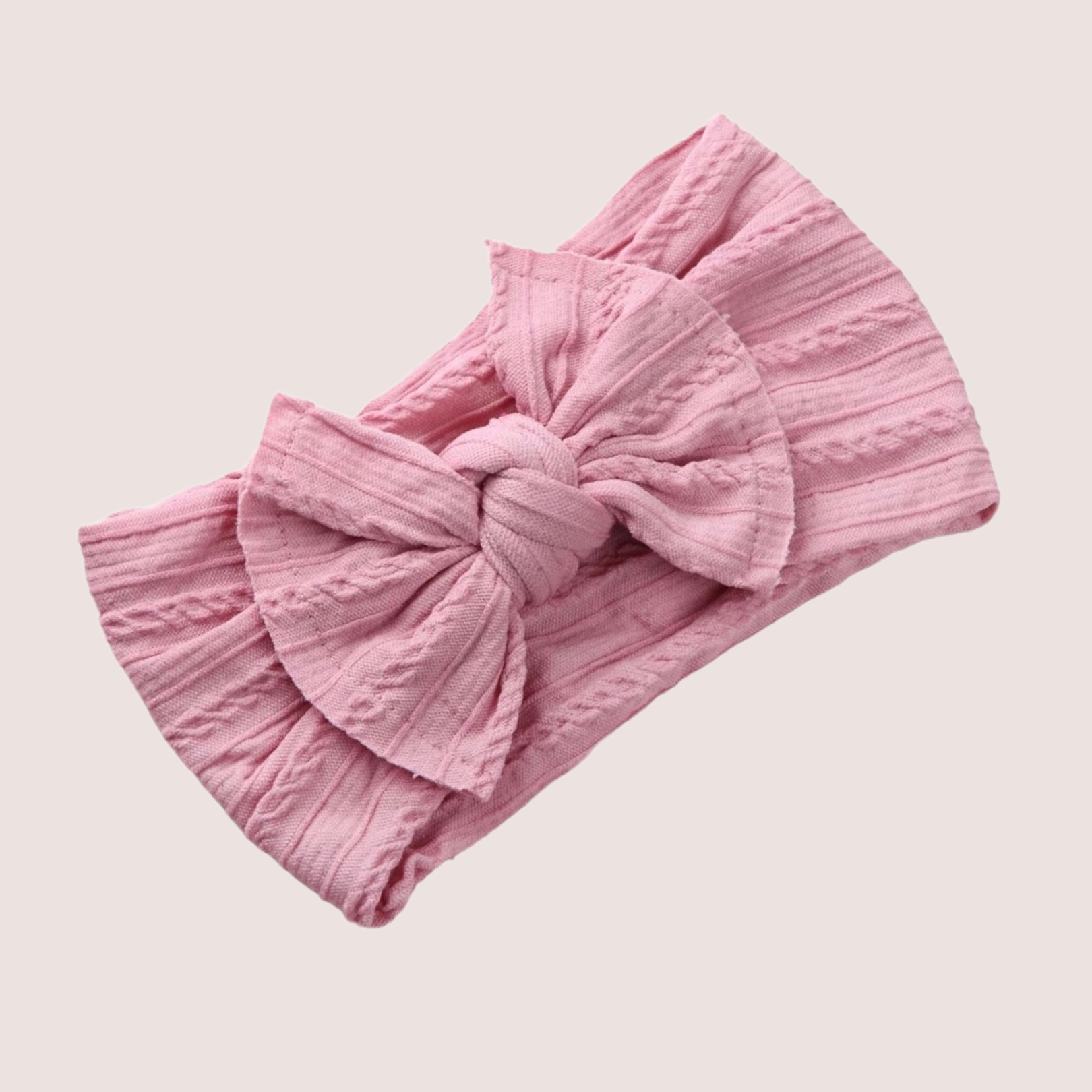 dusky pink cable knit headband for babies